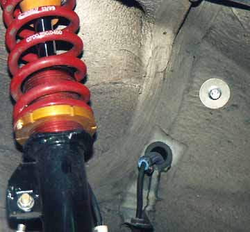Fender washer on the backside of the new coil bolt