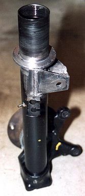 Front strut housing after welding on collar and sway bar mount reinforcement