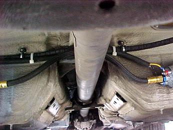 Layout of fuel lines over the driveshaft