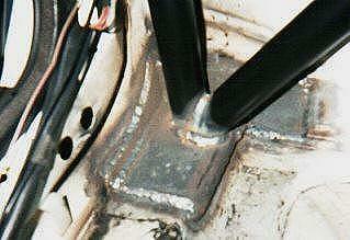 Another close-up of the passenger side baseplate